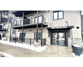 A building with the sign 2396 Cleroux Cres is shown.