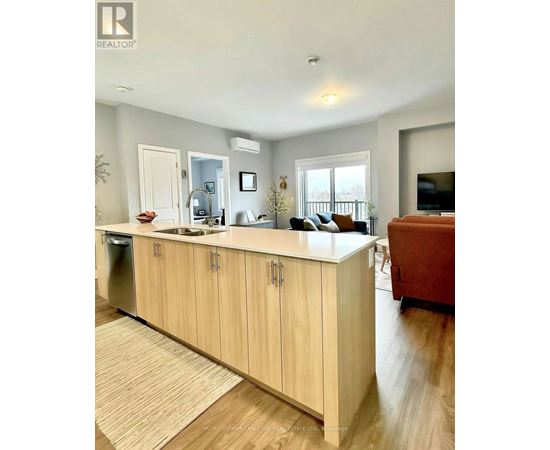 A kitchen with wooden cabinets and a countertop.