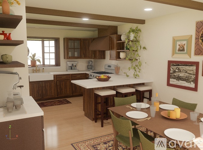 A kitchen with a table set for a meal.