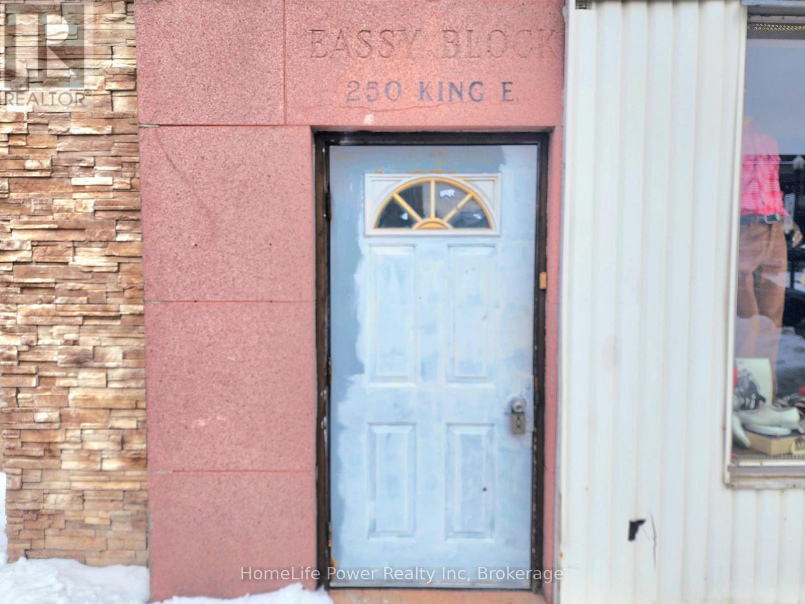 A door with a decorative design in the middle of it.