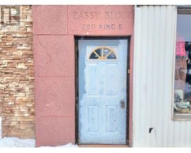 A door with a decorative design in the middle of it.