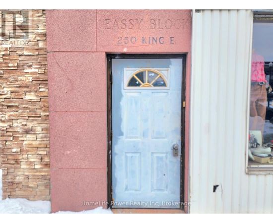 A door with a decorative design in the middle of it.