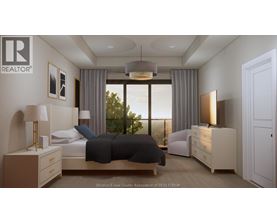 A bedroom with a large bed, two nightstands, and a dresser.