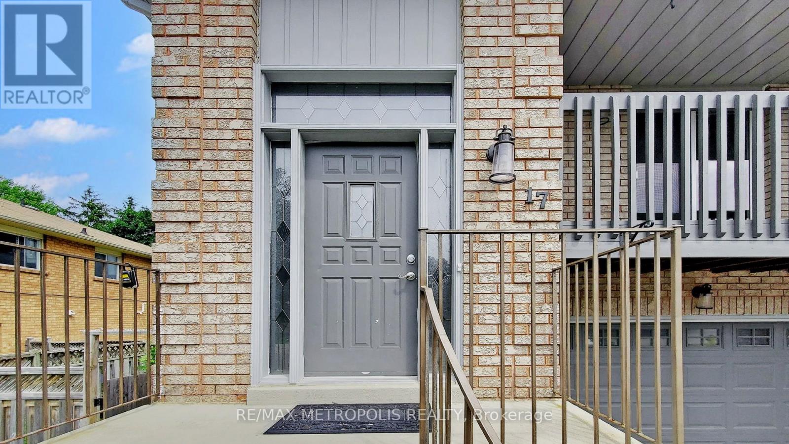 A grey door is the main focus of this image.