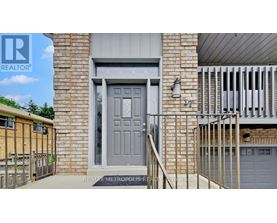 A grey door is the main focus of this image.