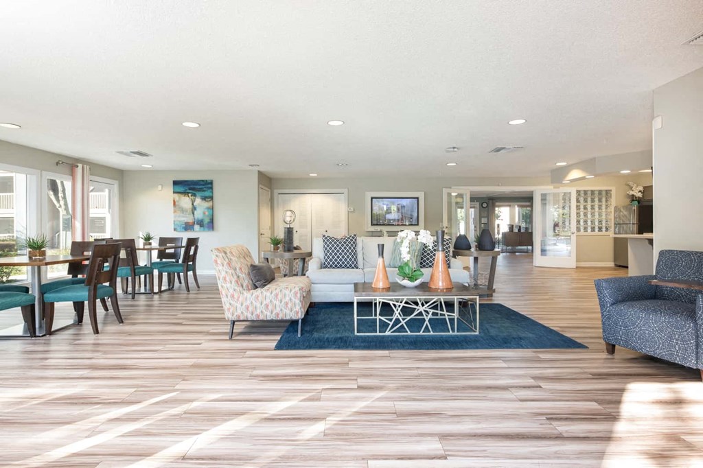 a living room with a couch and a table