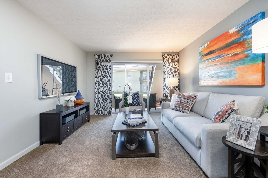 a living room with a couch and a coffee table