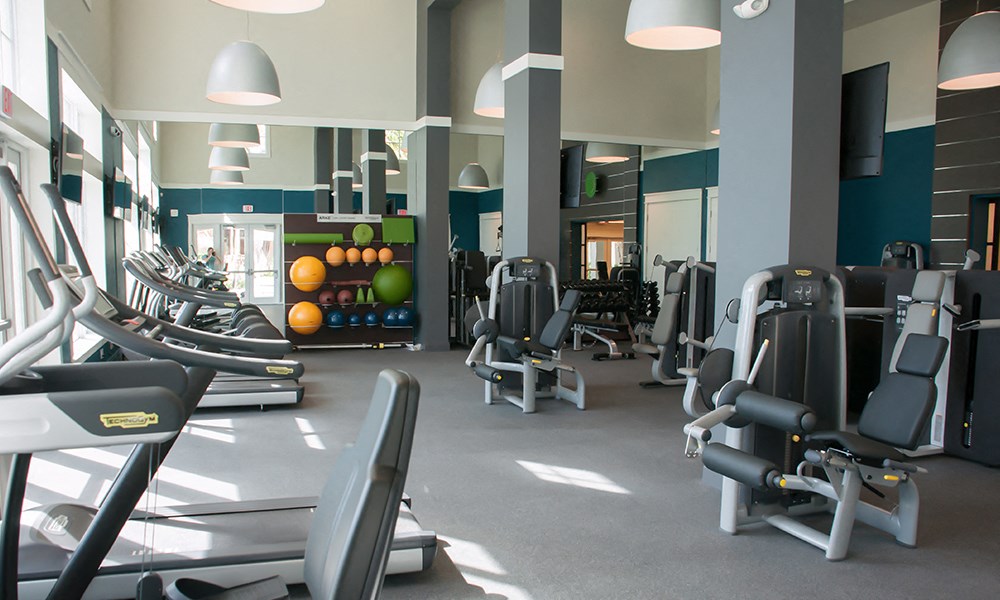 a gym with weights and other exercise equipment