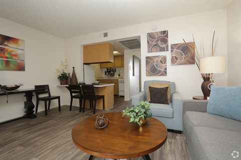 a living room with a couch and a table