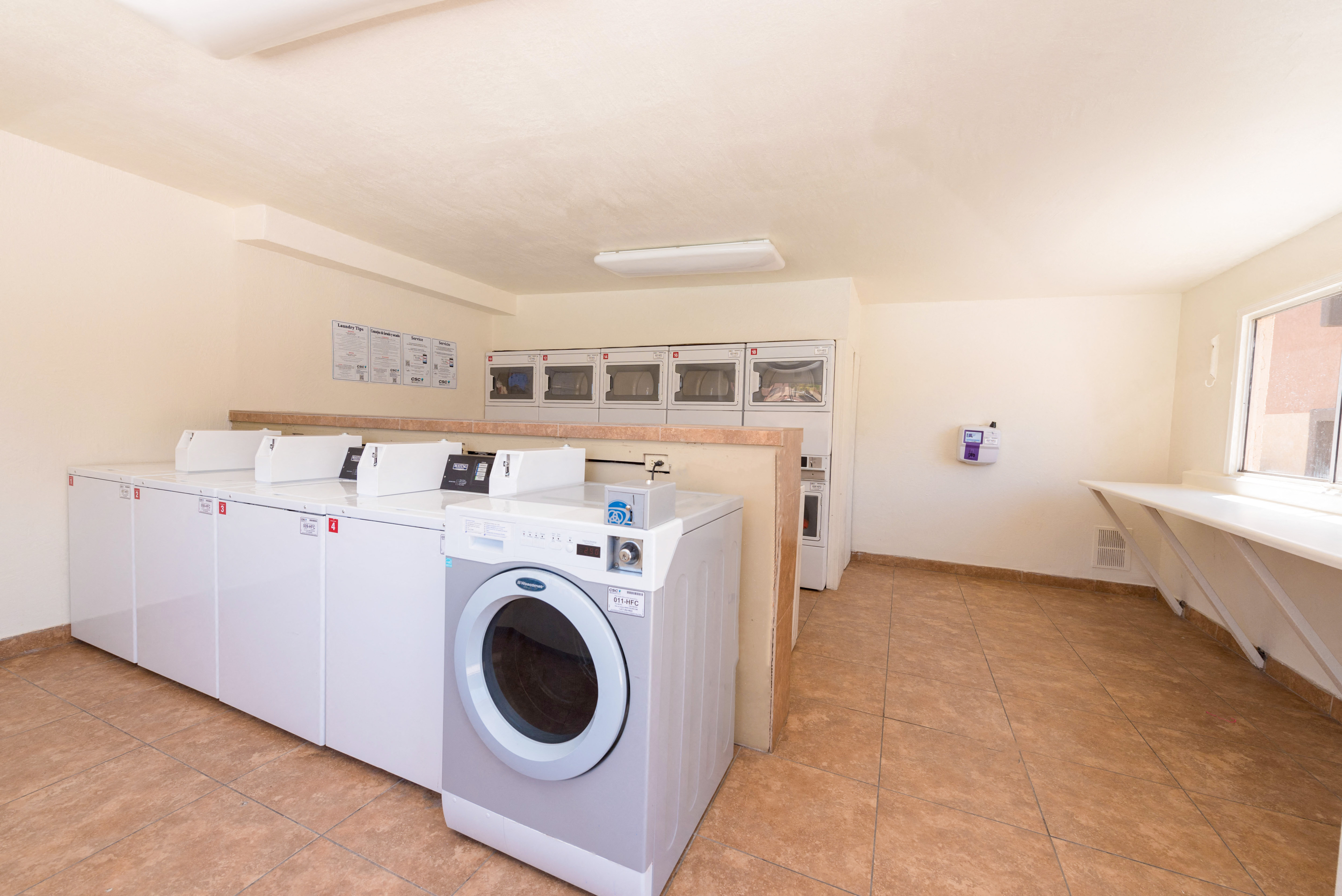 a washer and dryer in the laundry room of a home