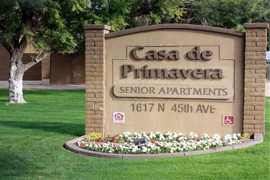 a sign for the campus of the senior apartments