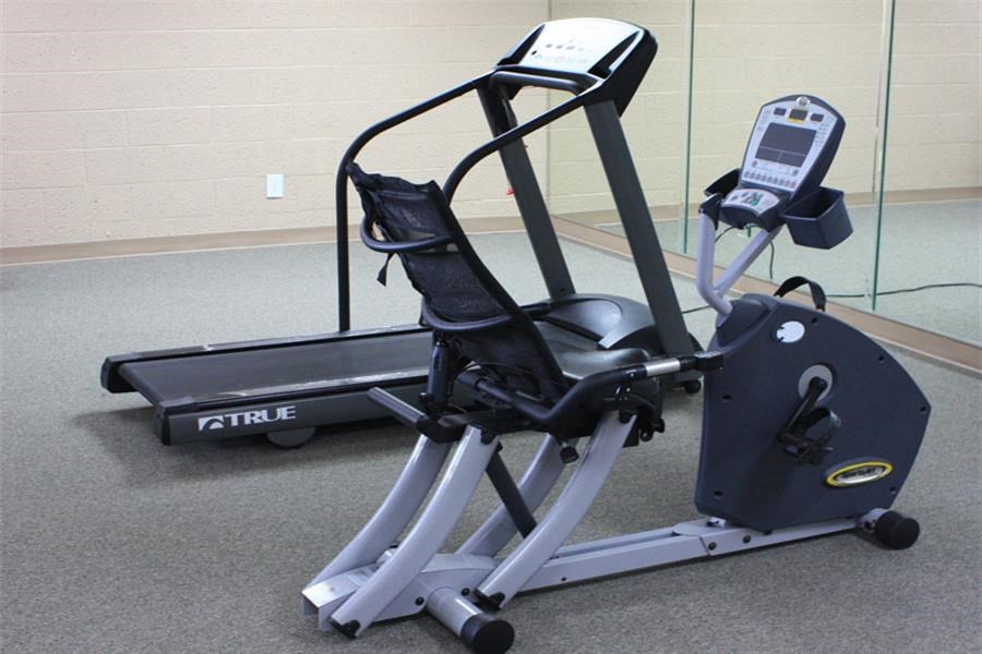 a exercise bike in a gym on a floor