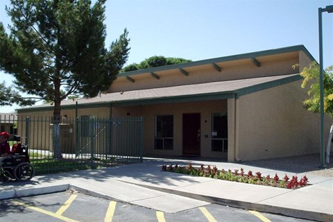 a building with a wheelchair parked outside of it