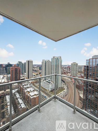 A view from a high-rise building looking down at a cityscape.