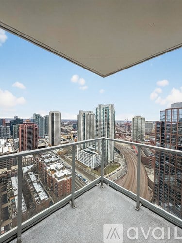 A view from a high-rise building looking down at a cityscape.