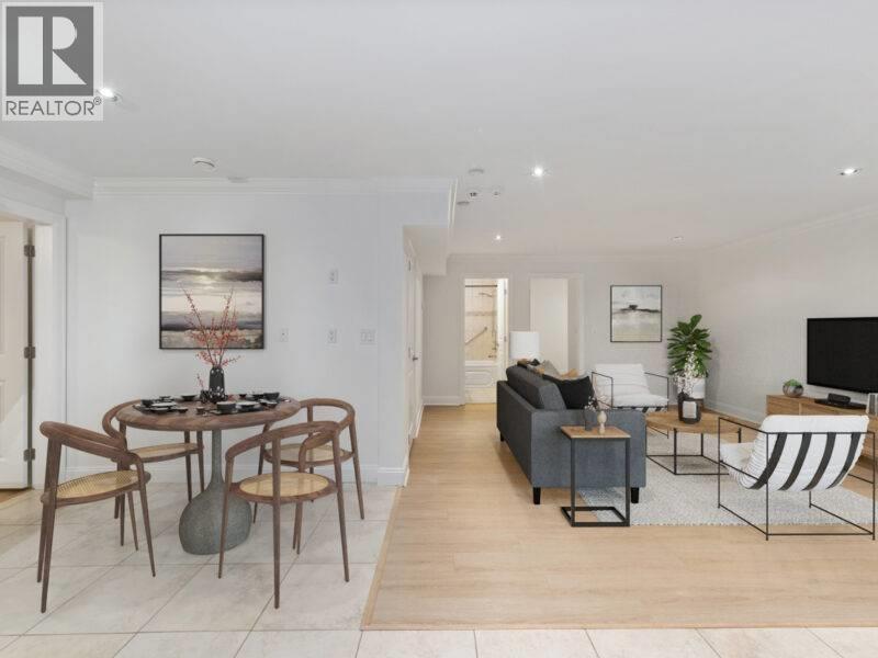 A living room with a dining table and chairs.