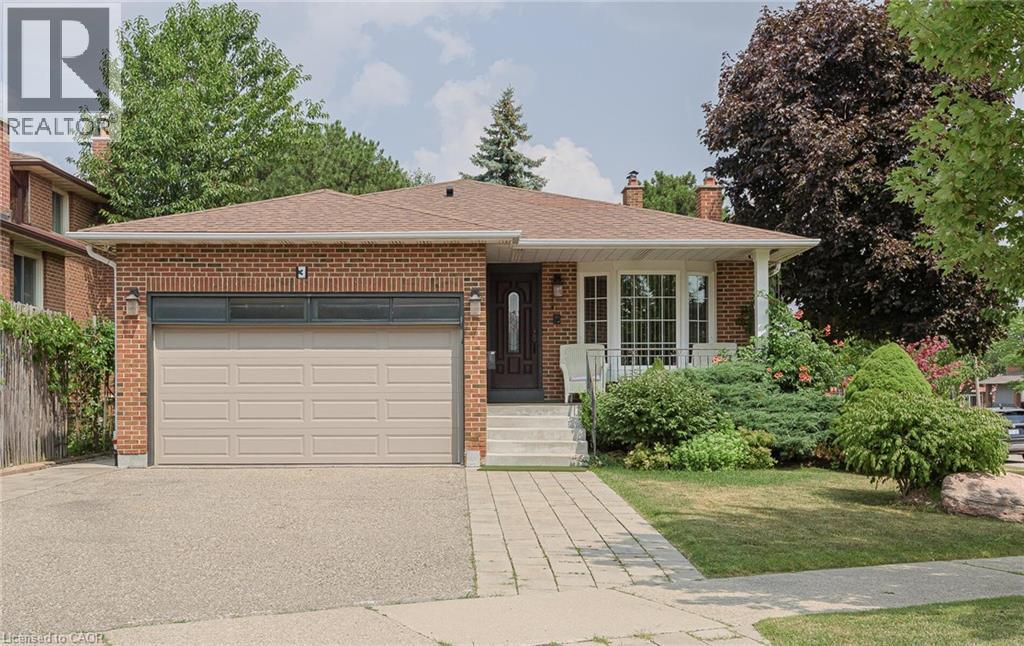 A house with a garage is for sale.