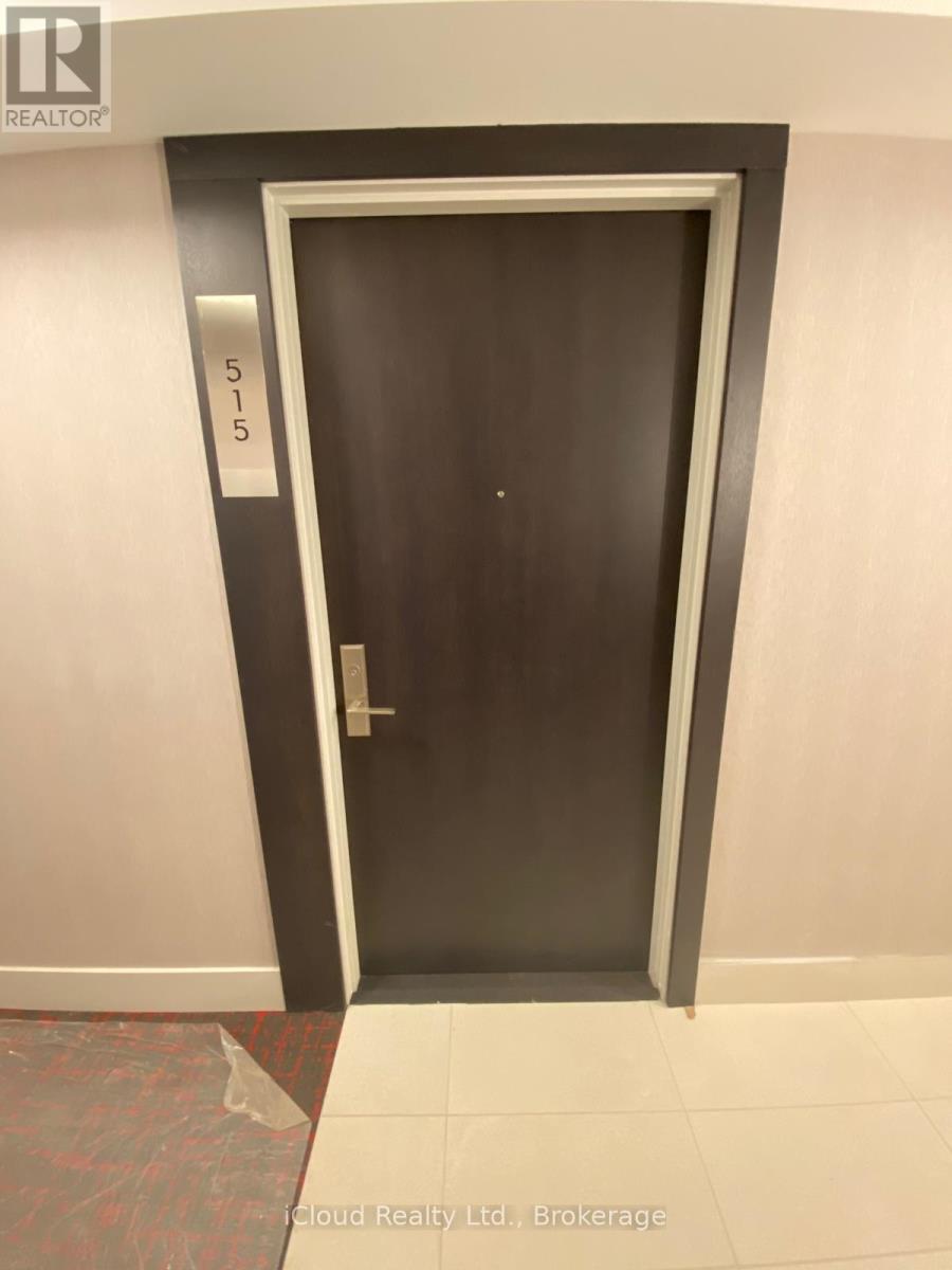 A brown door with the number 515 on it.