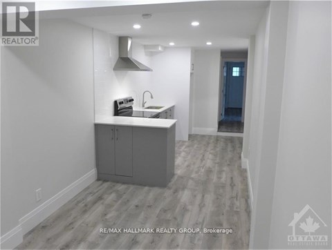 A modern kitchen with a sink and cabinets.