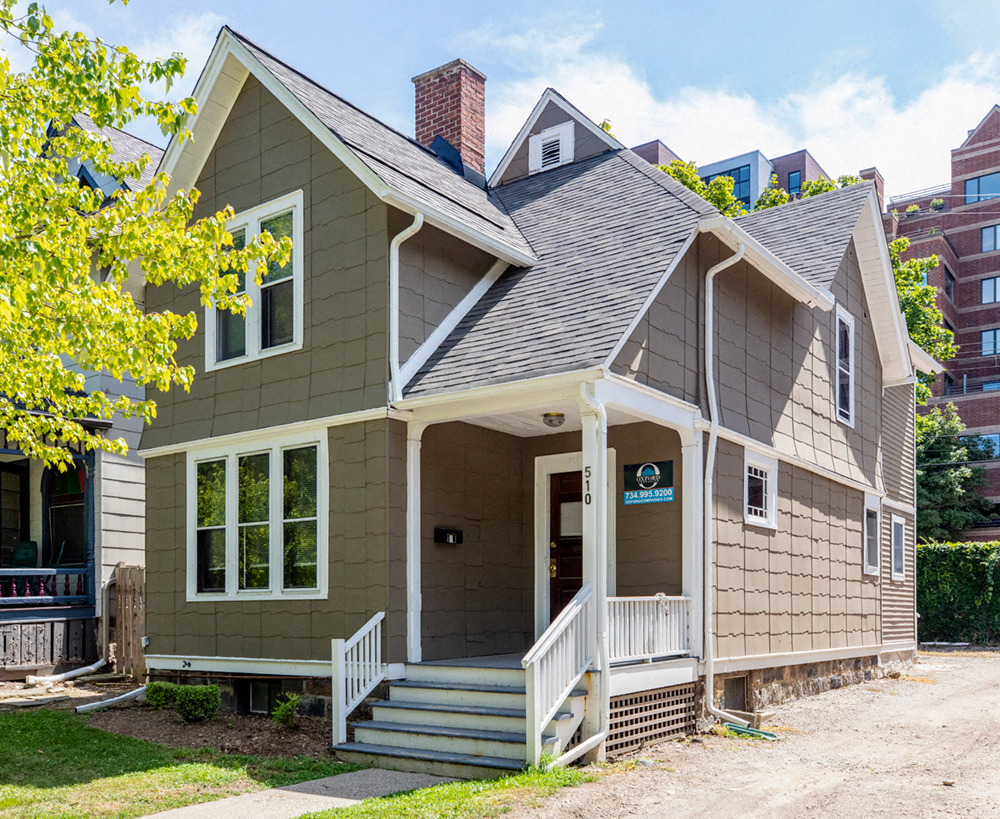 a small house with a front porch and