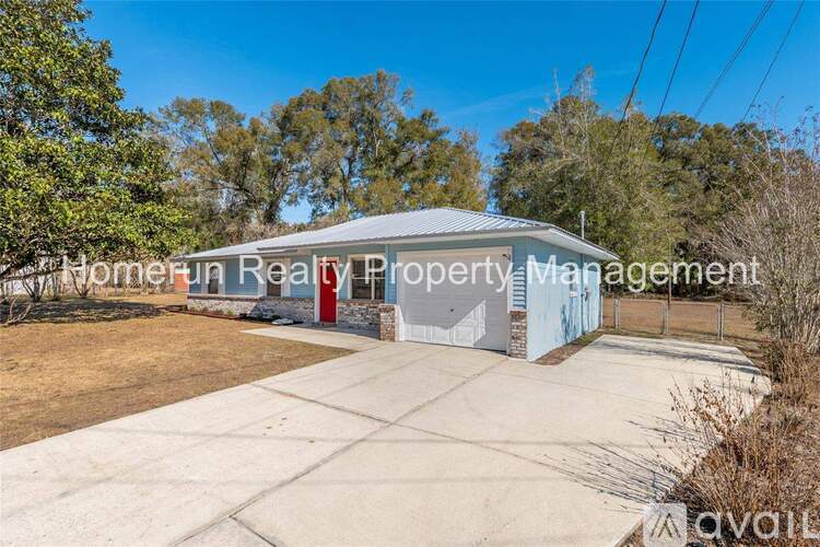 A property management company is advertising a home for sale.