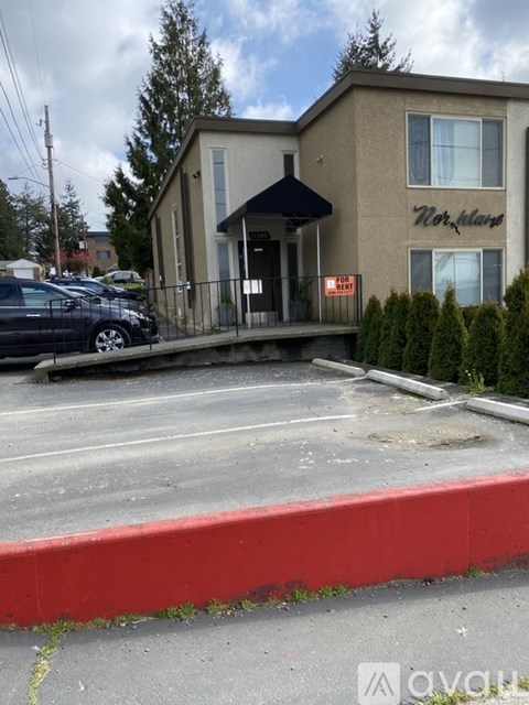 A Norlands sign is on a building.
