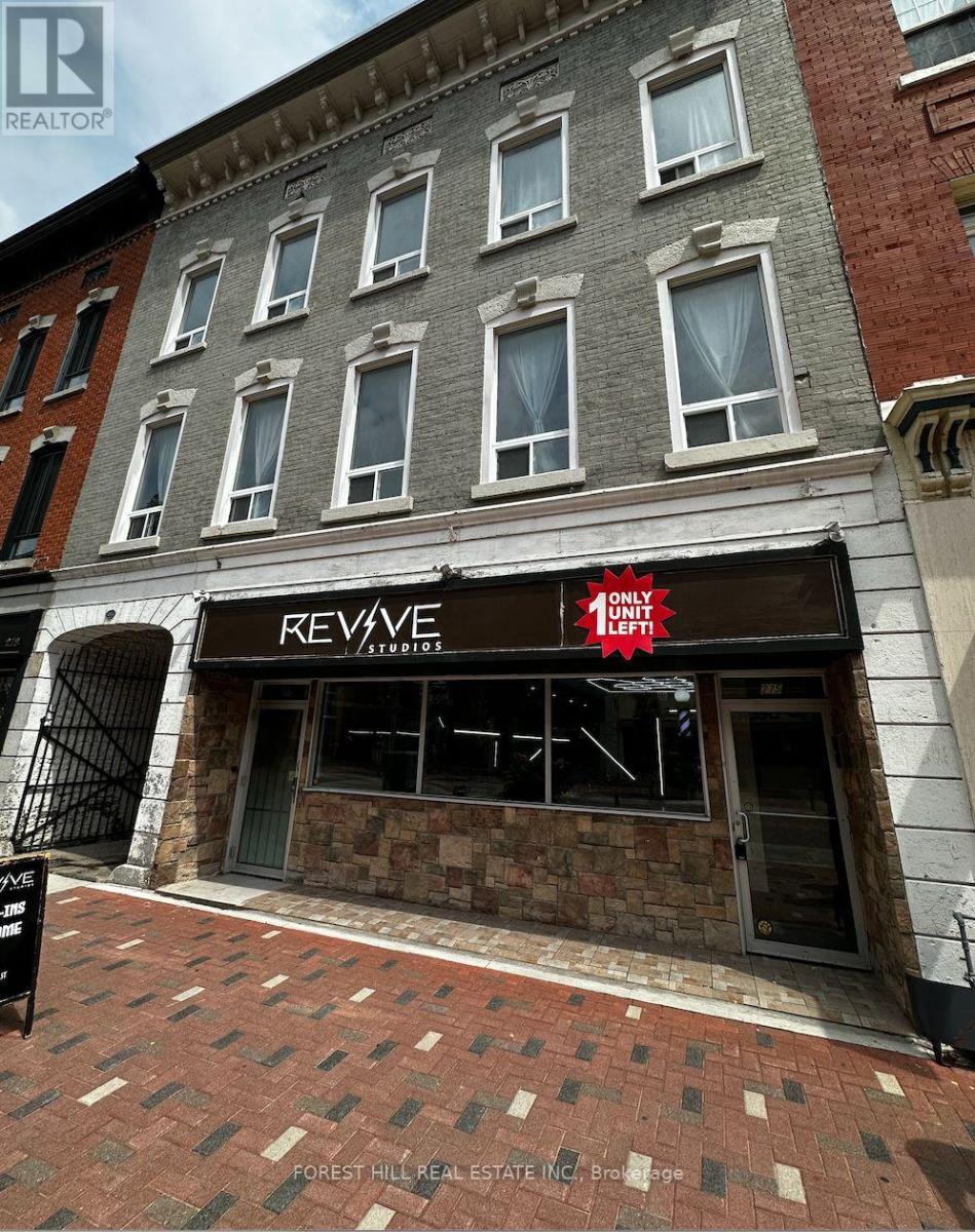 A building with a Revive Studios sign on the front.
