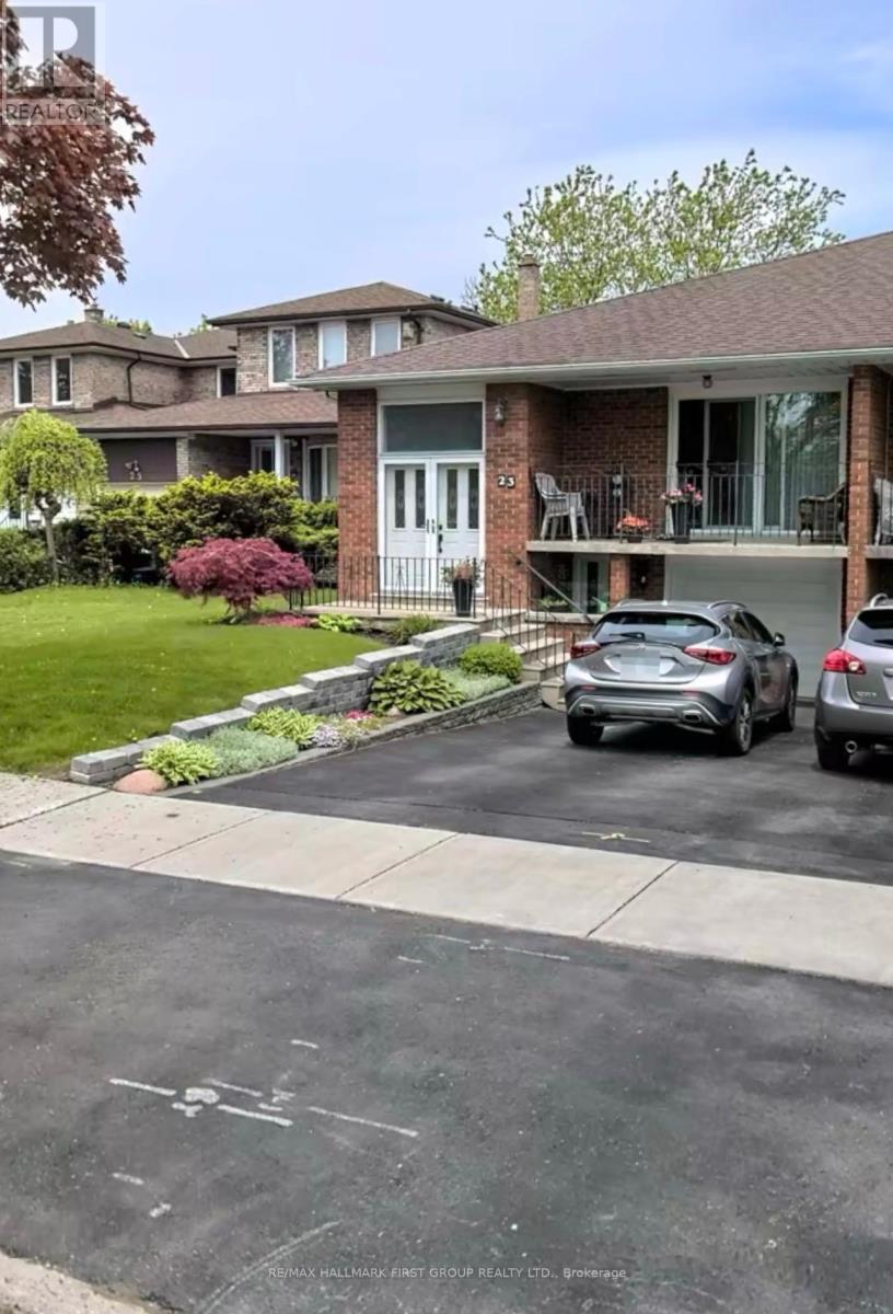 A house with a car parked in front of it.