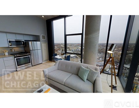 A modern kitchen with a view of the city.