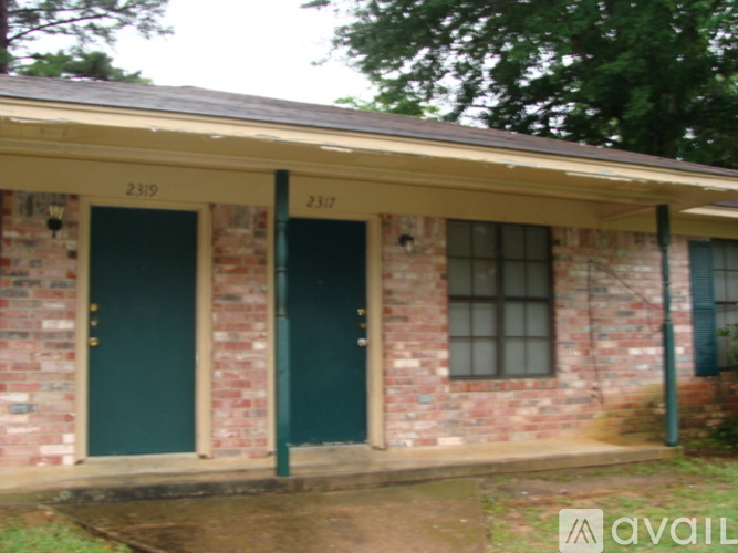 A building with the numbers 23159 and 2317 on it.