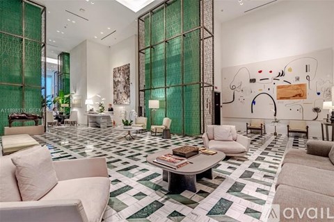 A living room with a green and white checkered floor.