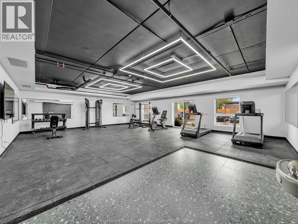 A spacious garage with a tiled floor and a high ceiling.