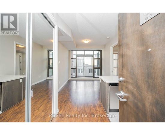 A brokerage office with a large open space and a view of the city.