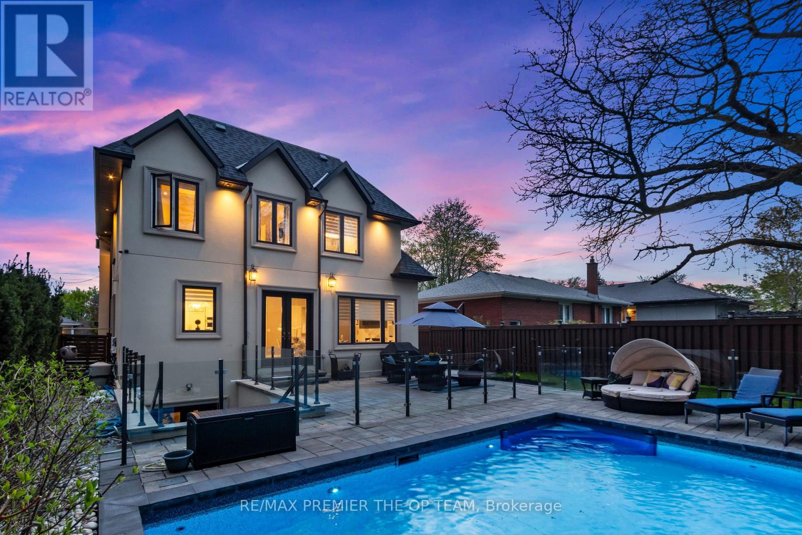 A house with a pool in the backyard.