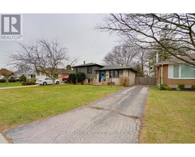 A real estate brokerage logo is displayed on a residential property listing.