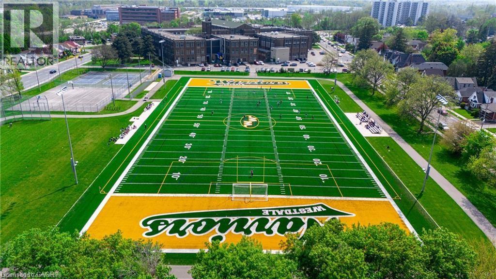 A football field with the word "Spartans" written on it.