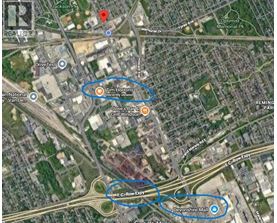A map shows a section of a city with roads, buildings, and a location marked "Tim Hortons.".
