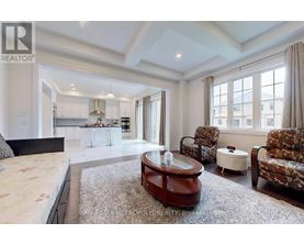 A spacious bedroom with a large bed and a coffee table.