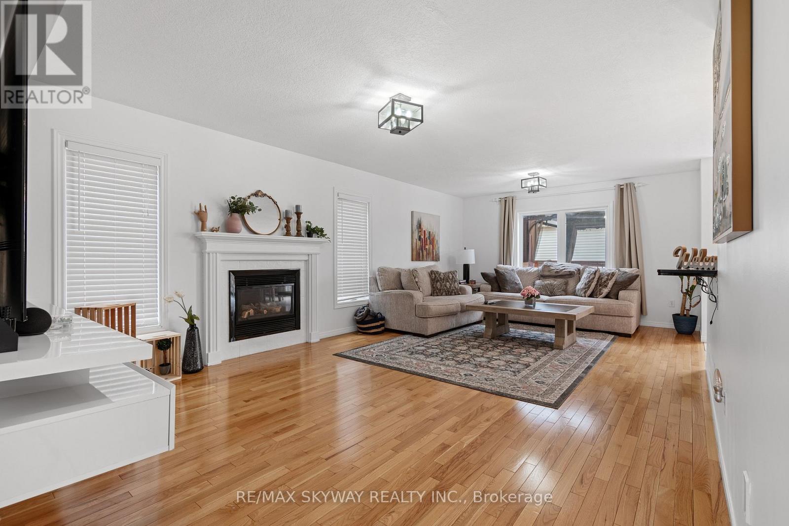 A living room with a fireplace and a couch.