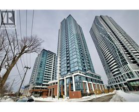 Three modern high-rise buildings are shown in the image.