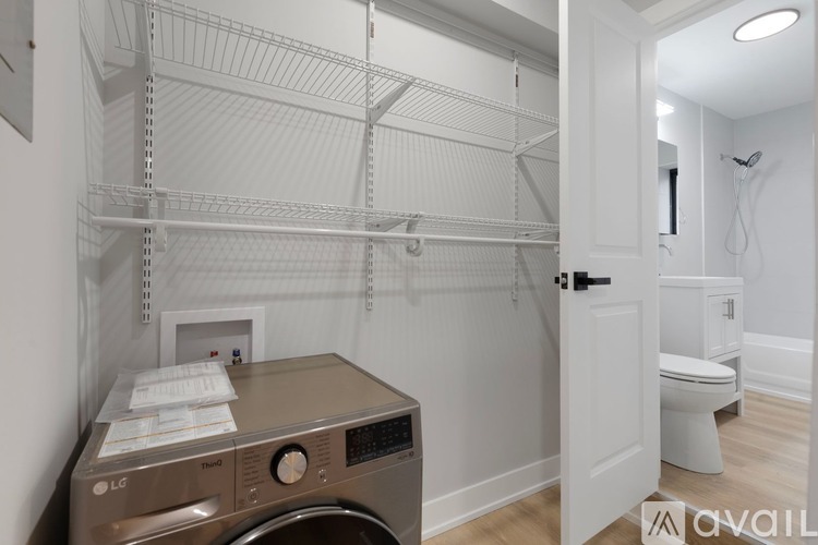 A laundry room with a washer and dryer.