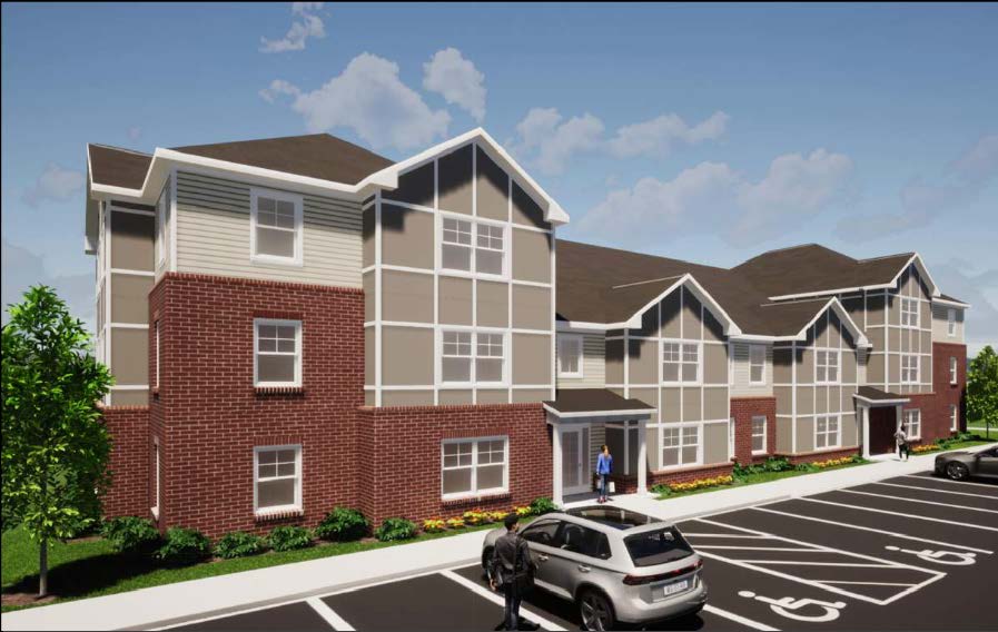 A modern apartment complex with a parking lot in front.