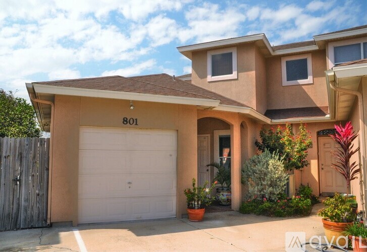 A house with the number 801 on the front wall.