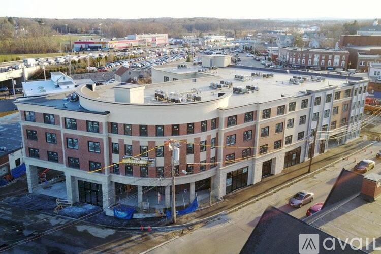 A large building under construction with a lot of windows.
