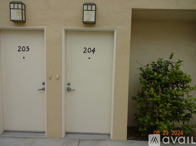 Two doors with numbers 205 and 204 on them.