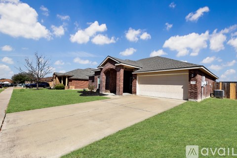 A house with a garage is available for sale.