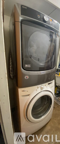 A stack of a washing machine and dryer.