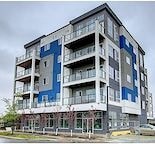 A large building with a blue and white design.