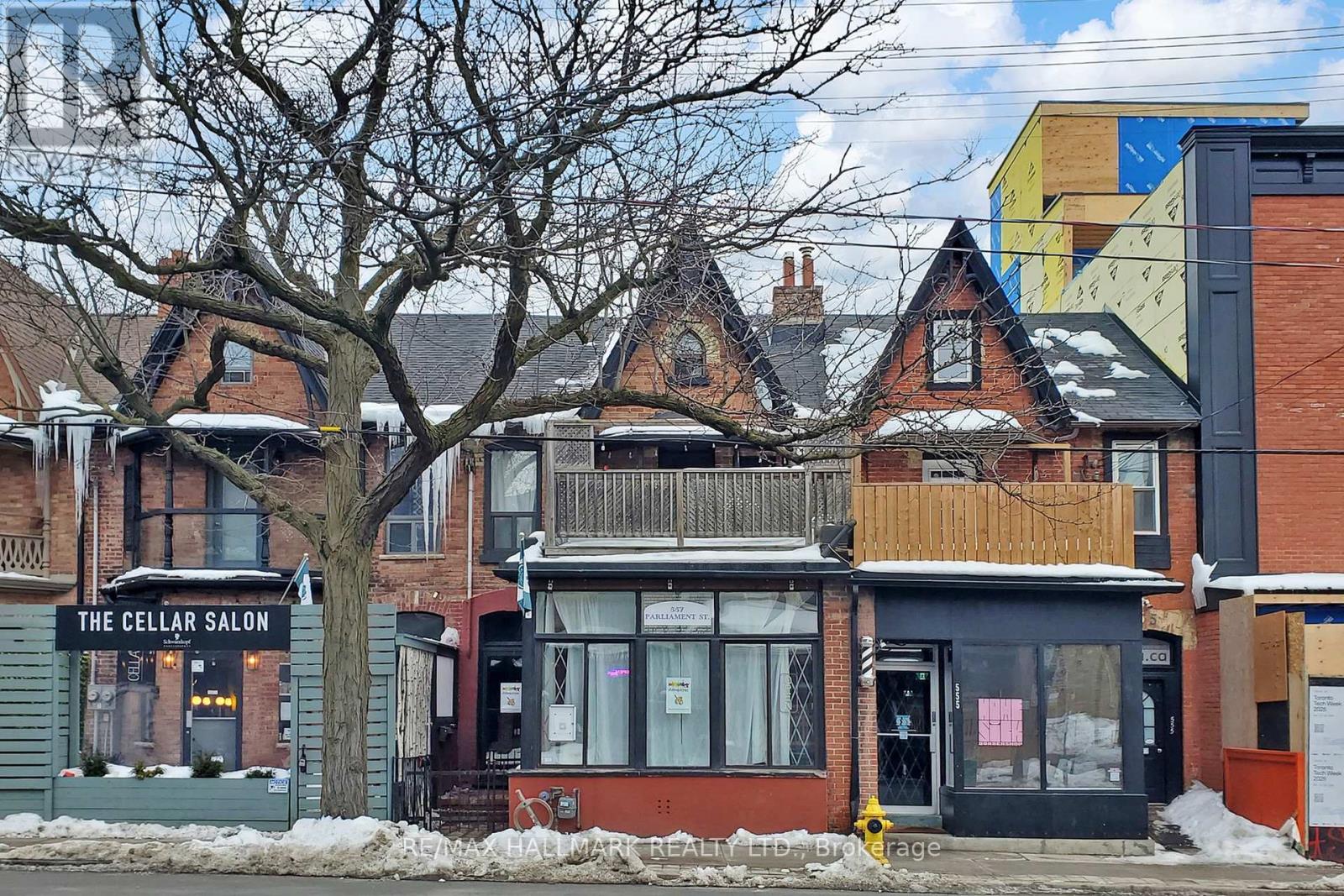 A street view of a salon named The Cellar Salon.