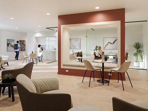 A modern living room with a dining area in the background.